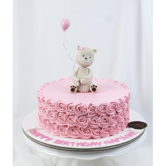 Sitting Bear on a Rosette Buttercream Cake Sitting Bear on a Rosette Buttercream Cake