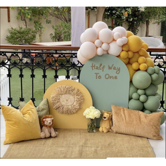Half way to One (Mini balloon garland 1 x Lion face prop on the backdrop 1 x Carpet , 1 cake stand 2 x Mini Backdrops (90cm H and 60cm H) Personalization on Backdrop 3 x Available pillows Soft toys not included) Half way to One (Mini balloon garland 1 x Lion face prop on the backdrop 1 x Carpet , 1 cake stand 2 x Mini Backdrops (90cm H and 60cm H) Personalization on Backdrop 3 x Available pillows Soft toys not included)