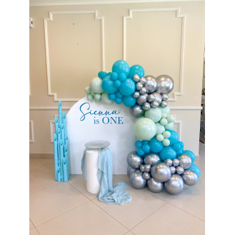 Mini Mermaid (Balloon garland 1.3m Semi arch backdrop - White 1 x small circle table - white 1 x Cake Stand Personalization on Backdrop 1 x Coral stand)